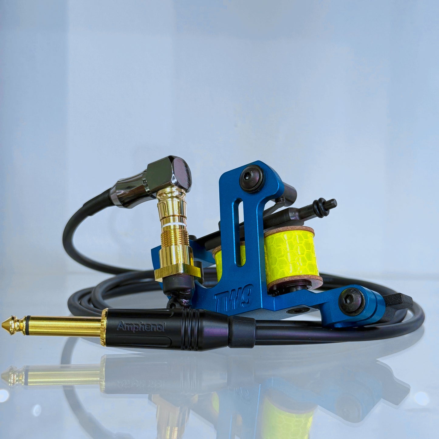 LEBA Fat One electric blue coil tattoo machine with RCA and clipcord connection, includes 90-degree cable