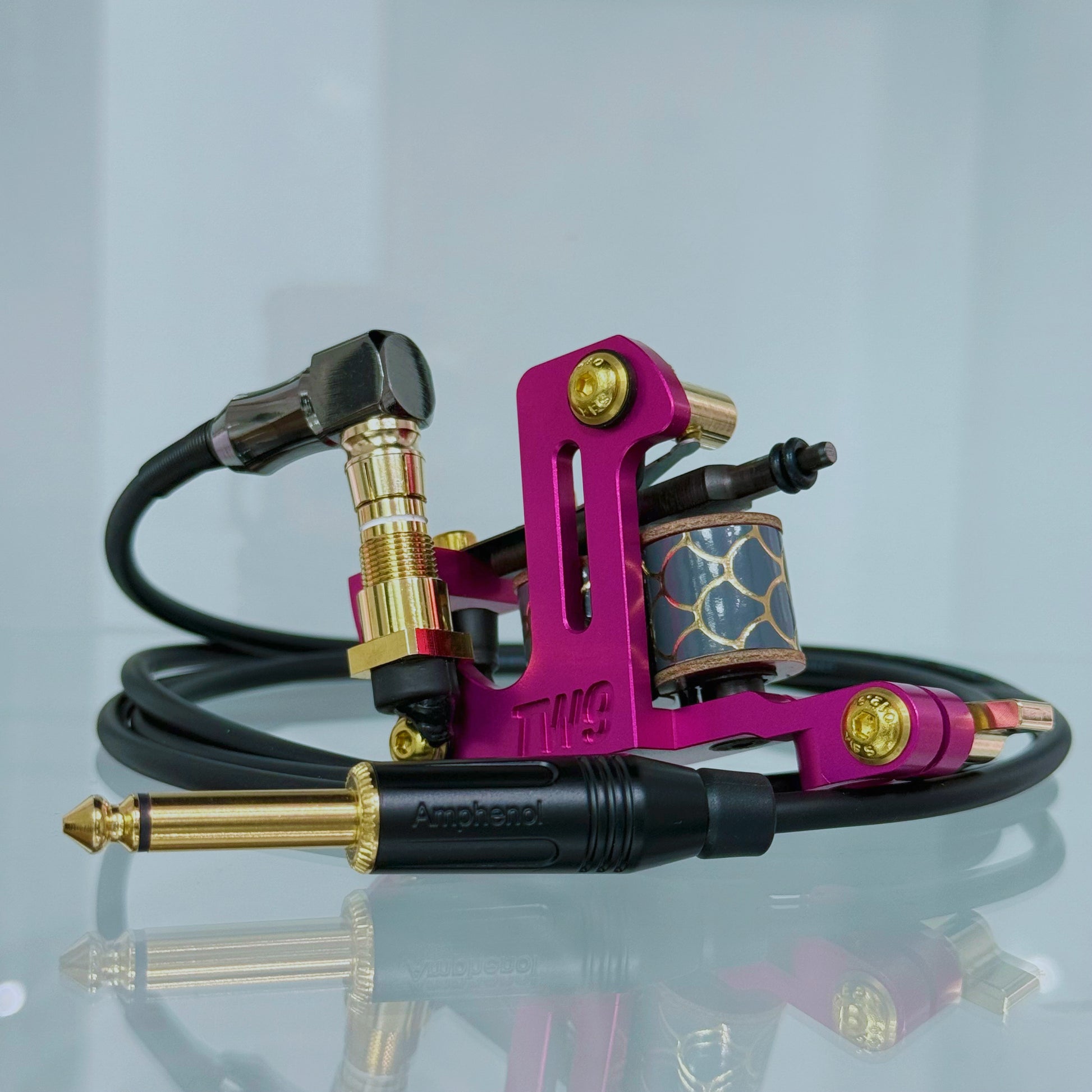 LEBA Fat One fuchsia pink coil tattoo machine with RCA and clipcord connection, includes 90-degree cable