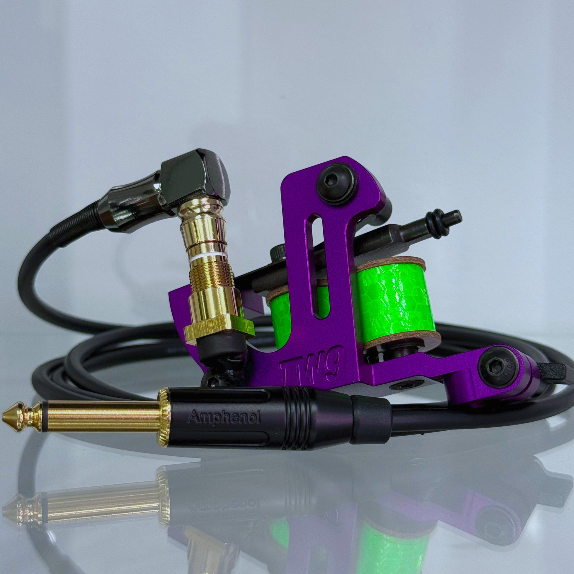 LEBA Fat One purple coil tattoo machine with RCA and clipcord connection, includes 90-degree cable