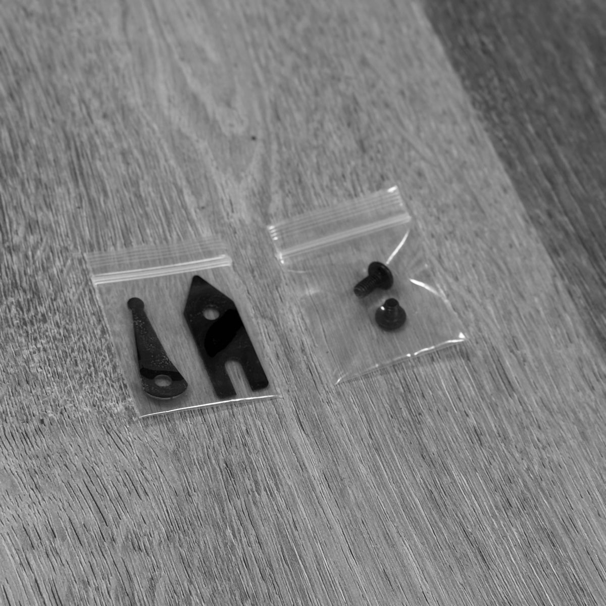 LEBA tattoo machine spring set in black, including screws