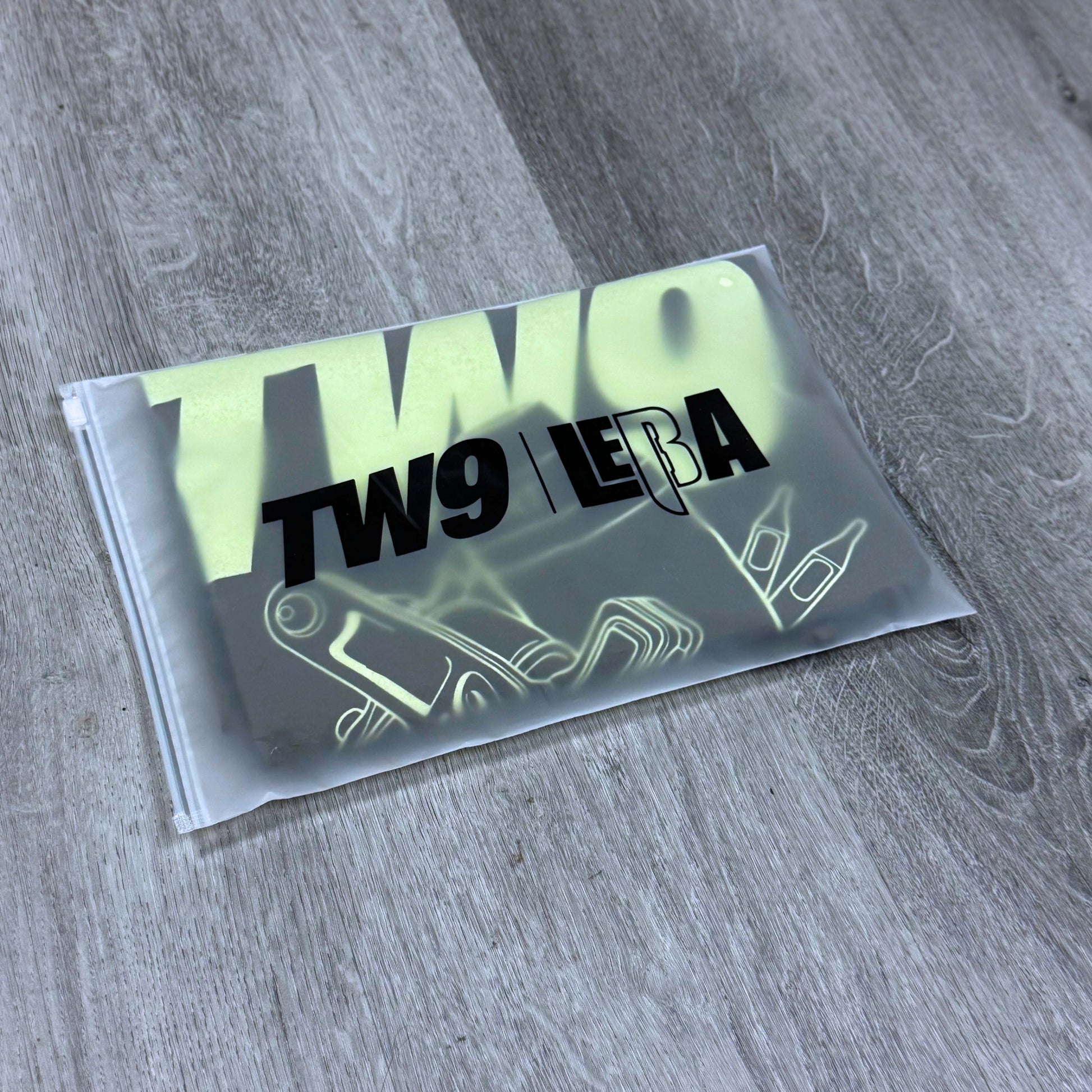 TW9 Machines T-shirt packaging